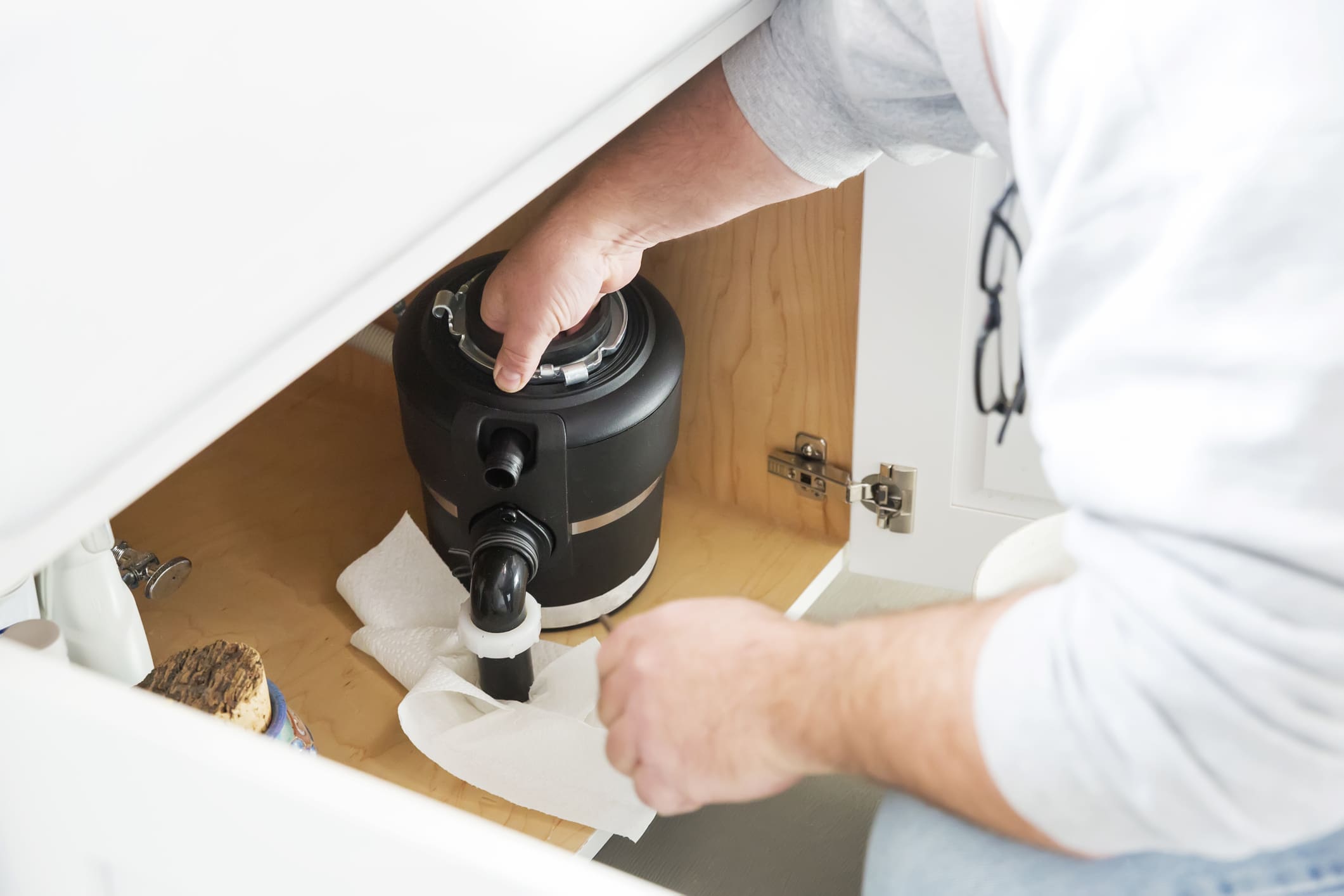 Plumber Installing Garbage Disposal