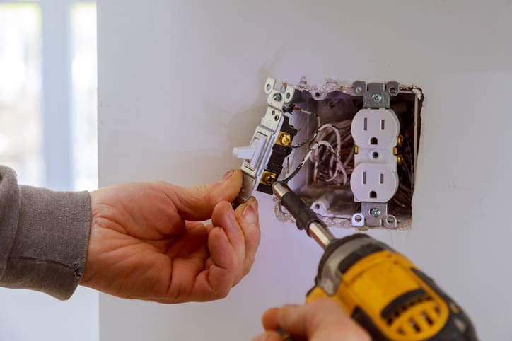 Electrician Installing Light Switch