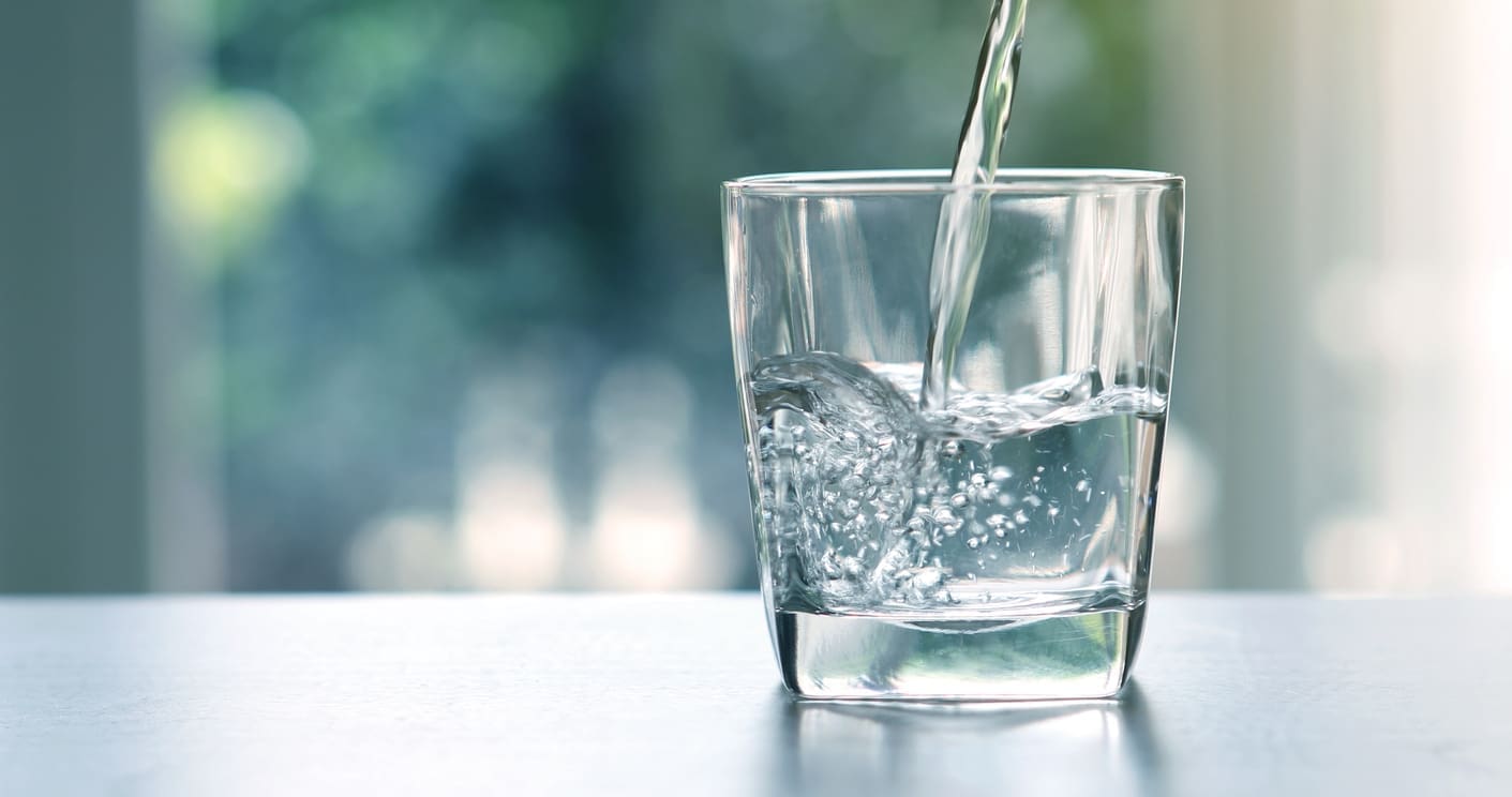 Pouring Water Into Glass